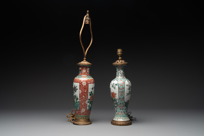 A Chinese famille verte covered jar, two vases mounted as lamps and a tazza, 19th C.