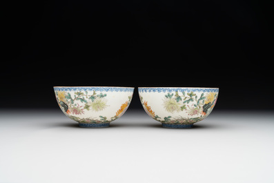 A pair of Chinese famille rose eggshell bowls with floral design, Qianlong mark, 20th C.