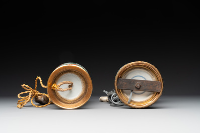A Chinese famille verte covered jar, two vases mounted as lamps and a tazza, 19th C.