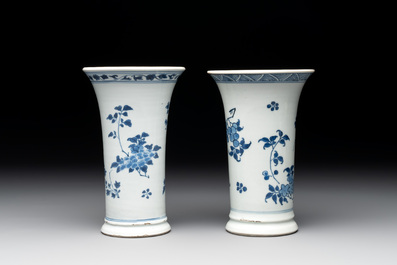 A pair of Chinese blue and white beaker vases with floral sprigs, Transitional period