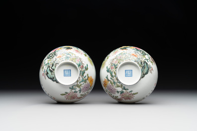 A pair of Chinese famille rose eggshell bowls with floral design, Qianlong mark, 20th C.