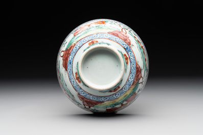 Two Dutch-decorated Chinese blue and white bowls with figures and landscapes, Qianlong