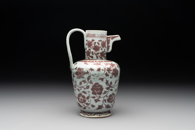 A Chinese copper-red and white 'flower scroll' ewer, Ming or later