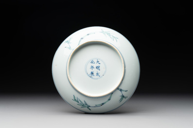A Chinese doucai 'playing boys' plate, Chenghua mark, 18th C.
