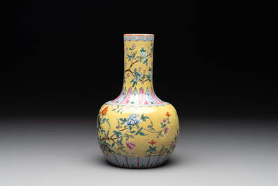 A Chinese famille rose yellow-ground bottle vase, Bao Shan Zhai 寶善斎 mark, 19th C.