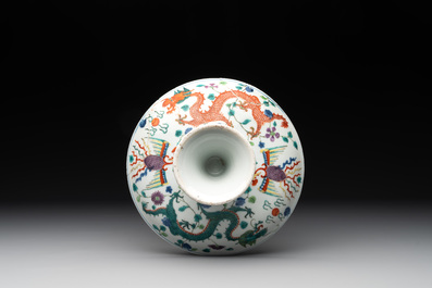 A Chinese famille verte covered jar, two vases mounted as lamps and a tazza, 19th C.
