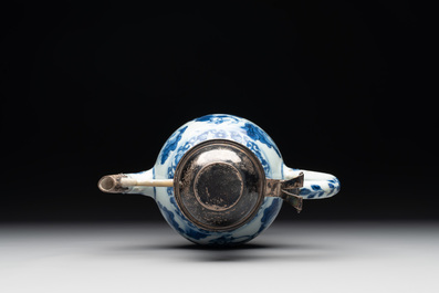 A Chinese silver-mounted blue and white 'Mongolian hunt' ewer, Transitional period