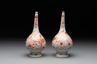 A pair of Chinese iron-red and gilt-decorated rose water sprinklers, Kangxi