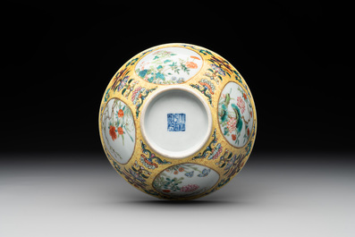 A Chinese blue, white and famille rose bowl with floral design, Qianlong mark, 19/20th C.