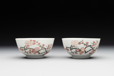 A pair of fine Chinese famille rose cups and saucers with floral design, Yongzheng