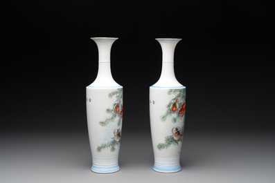 A pair of Chinese famille rose eggshell 'goldfish' vases, 20th C.