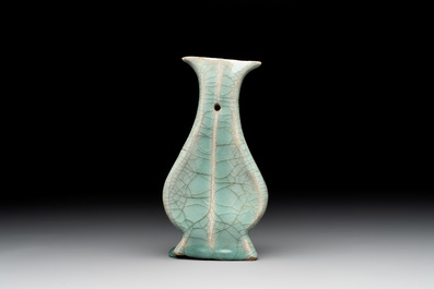 A Chinese Longquan celadon lobed bottle vase, Song