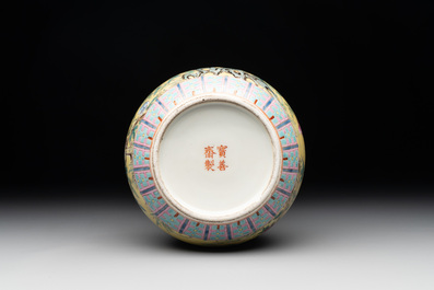 A Chinese famille rose yellow-ground bottle vase, Bao Shan Zhai 寶善斎 mark, 19th C.