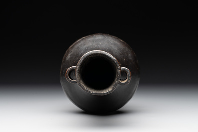 A Chinese bronze 'touhu' vase, Yuan