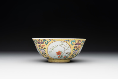 A Chinese blue, white and famille rose bowl with floral design, Qianlong mark, 19/20th C.