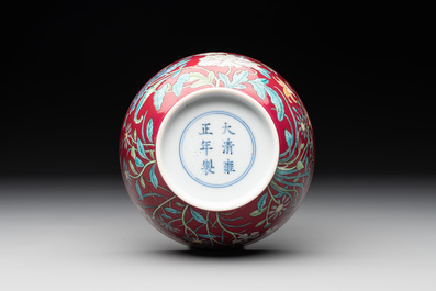 A Chinese famille rose ruby-ground 'peony' bowl, Yongzheng mark, 19/20th C.