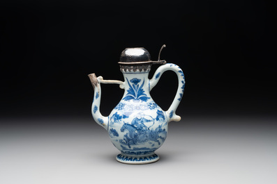 A Chinese silver-mounted blue and white 'Mongolian hunt' ewer, Transitional period