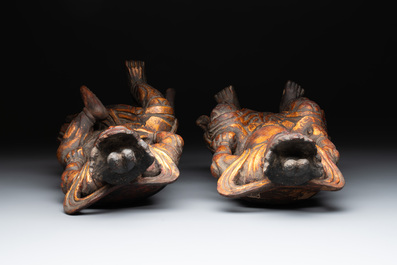 A pair of Chinese gilt-lacquered wooden sculptures of guardians, Qing