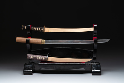 A collection of fine Japanese sword handles, guards, sheaths, a sword and a lacquered stand, Edo, 18/19th C.