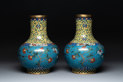 A pair of large Chinese cloisonn&eacute; 'magpies among flowering branches' vases, 19th C.
