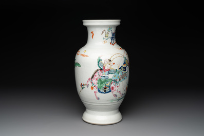 A Chinese famille rose 'warriors on horseback' vase, 18/19th C.