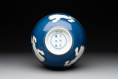A Chinese powder blue-ground biscuit, blue and white 'Buddhist lion' bowl, Xuande mark, Kangxi