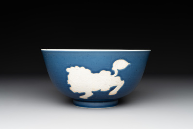 A Chinese powder blue-ground biscuit, blue and white 'Buddhist lion' bowl, Xuande mark, Kangxi