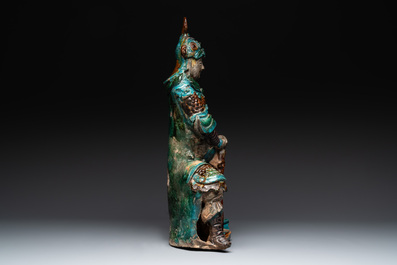 An impressive and fine Chinese sancai-glazed biscuit Guandi, Ming, 17th C.