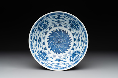 A Chinese powder blue-ground biscuit, blue and white 'Buddhist lion' bowl, Xuande mark, Kangxi