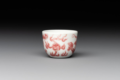 A small Chinese blue, white and copper-red 'dragon' wine cup, Lang Jin Ge Zhi 郎唫閣製 mark, 19/20th C.