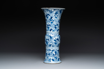 A Chinese blue and white 'landscape' 'gu' vase, Kangxi