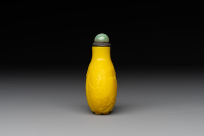 A Chinese yellow Peking glass 'elephant' snuff bottle, Xing You Heng Tang 行有恆堂 mark, 19th C.