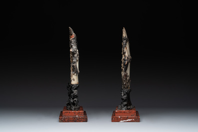 A pair of Chinese carved soapstone groups and a painted alabaster and wood table screen depicting a folk tale, 18/19th C.