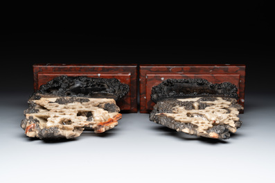 A pair of Chinese carved soapstone groups and a painted alabaster and wood table screen depicting a folk tale, 18/19th C.