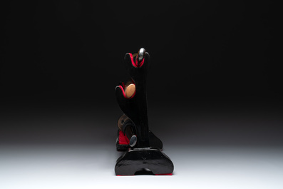 A collection of fine Japanese sword handles, guards, sheaths, a sword and a lacquered stand, Edo, 18/19th C.