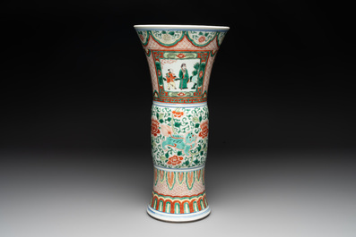A Chinese wucai 'gu' vase with Buddhist lions, peony scrolls and figures, 19th C.