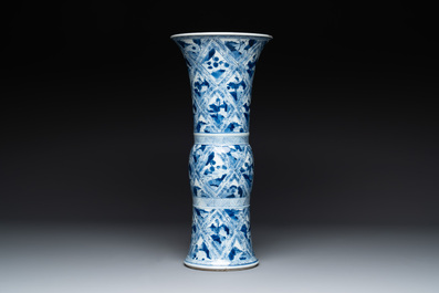 A Chinese blue and white 'landscape' 'gu' vase, Kangxi