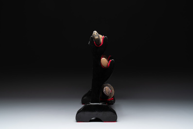 A collection of fine Japanese sword handles, guards, sheaths, a sword and a lacquered stand, Edo, 18/19th C.