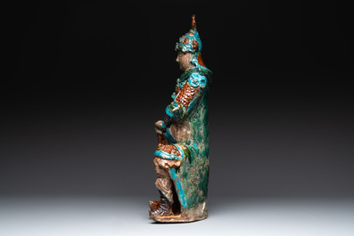 An impressive and fine Chinese sancai-glazed biscuit Guandi, Ming, 17th C.