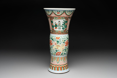 A Chinese wucai 'gu' vase with Buddhist lions, peony scrolls and figures, 19th C.