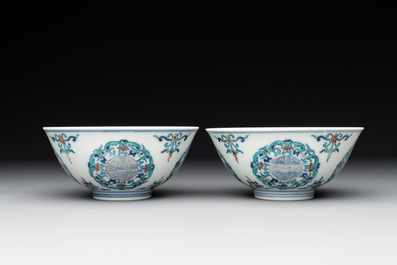 A pair of Chinese doucai 'shou' bowls, Yongzheng mark, 20th C.