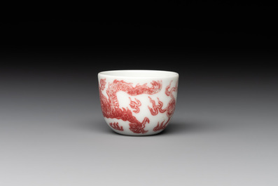 A small Chinese blue, white and copper-red 'dragon' wine cup, Lang Jin Ge Zhi 郎唫閣製 mark, 19/20th C.