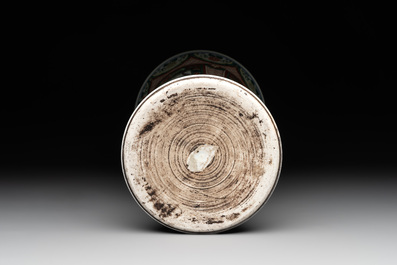 A Chinese wucai 'gu' vase with Buddhist lions, peony scrolls and figures, 19th C.