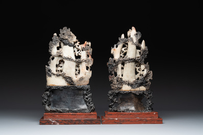 A pair of Chinese carved soapstone groups and a painted alabaster and wood table screen depicting a folk tale, 18/19th C.