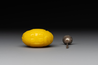 A Chinese yellow Peking glass 'elephant' snuff bottle, Xing You Heng Tang 行有恆堂 mark, 19th C.