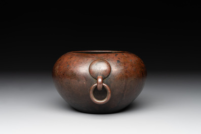 A Chinese bronze water pot with 'Taotie' handles, Xuande mark, 17/18th C.