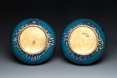 A pair of large Chinese cloisonn&eacute; 'magpies among flowering branches' vases, 19th C.