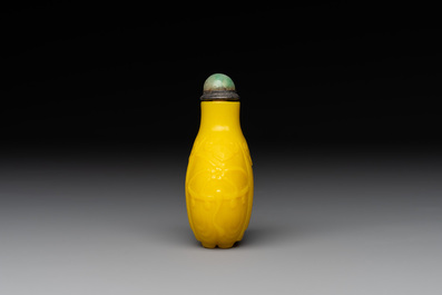 A Chinese yellow Peking glass 'elephant' snuff bottle, Xing You Heng Tang 行有恆堂 mark, 19th C.