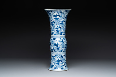 A Chinese blue and white 'landscape' 'gu' vase, Kangxi