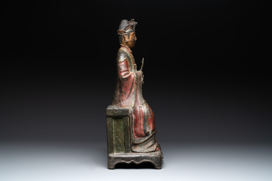 A large Chinese polychrome-lacquered and gilt bronze Daoist immortal, 17th C.